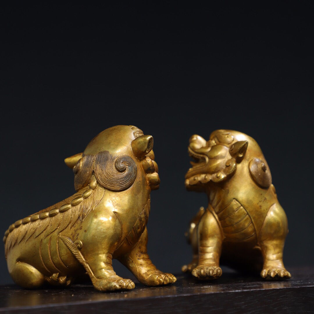 A pair of Chinese antique pure copper [lion] ornaments