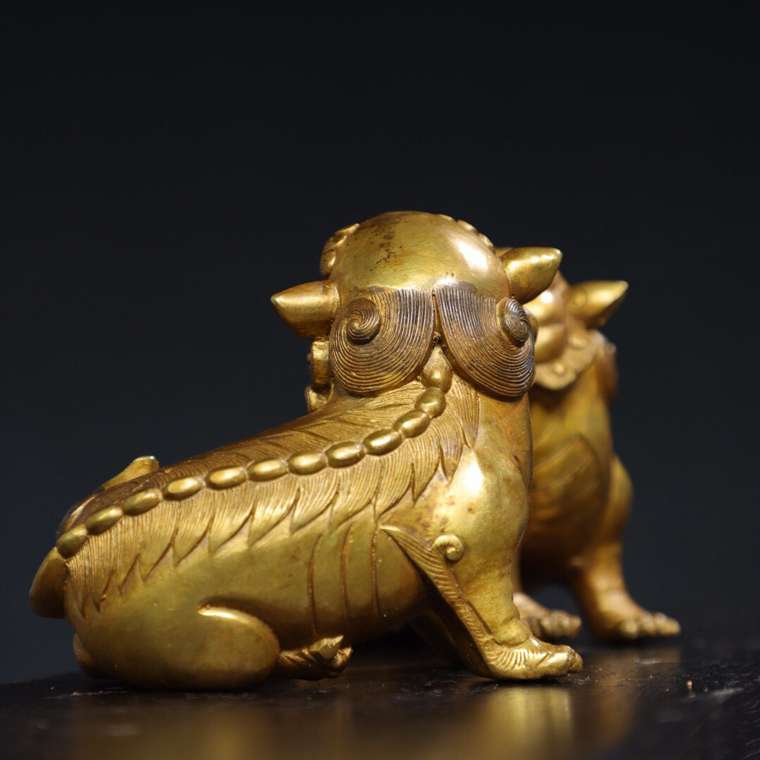 A pair of Chinese antique pure copper [lion] ornaments