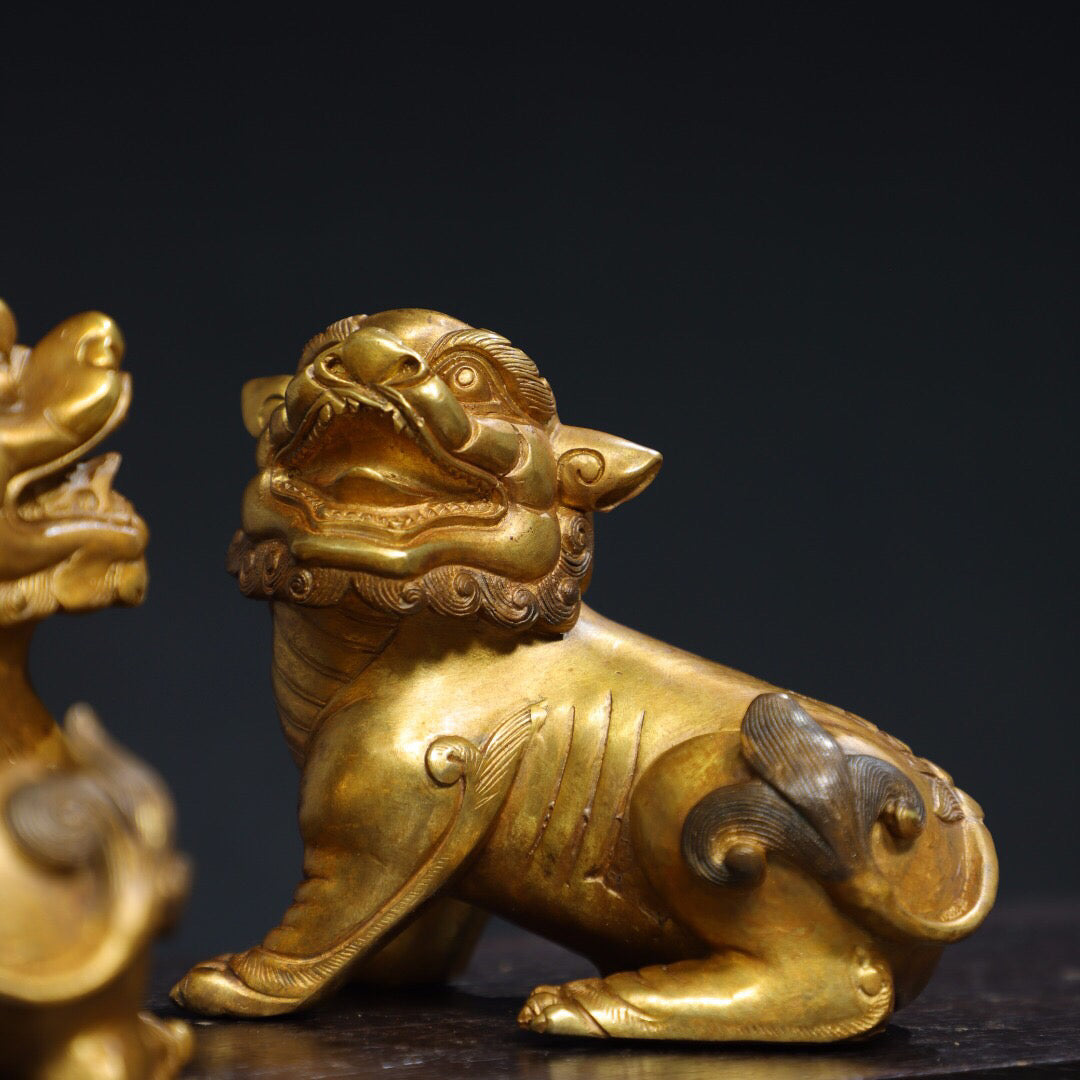 A pair of Chinese antique pure copper [lion] ornaments