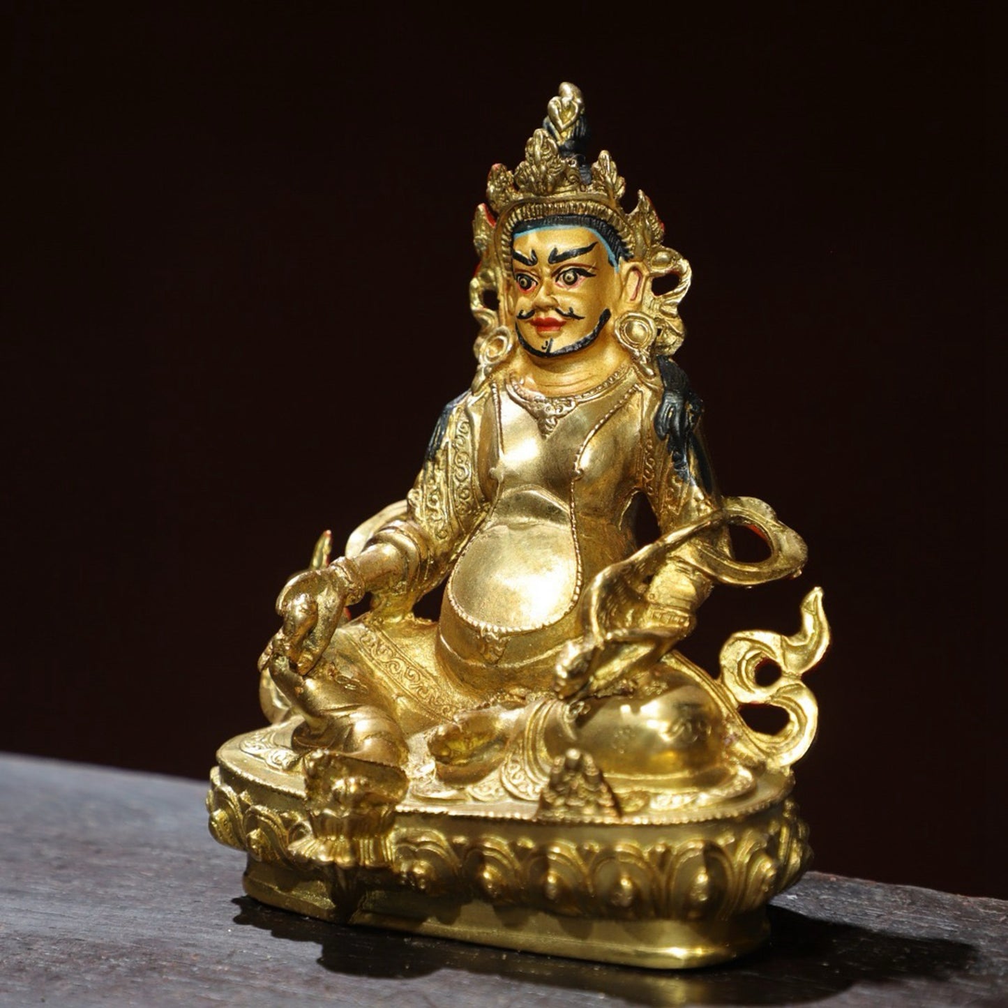 Bronze painted Buddha statue of the Yellow God of Wealth