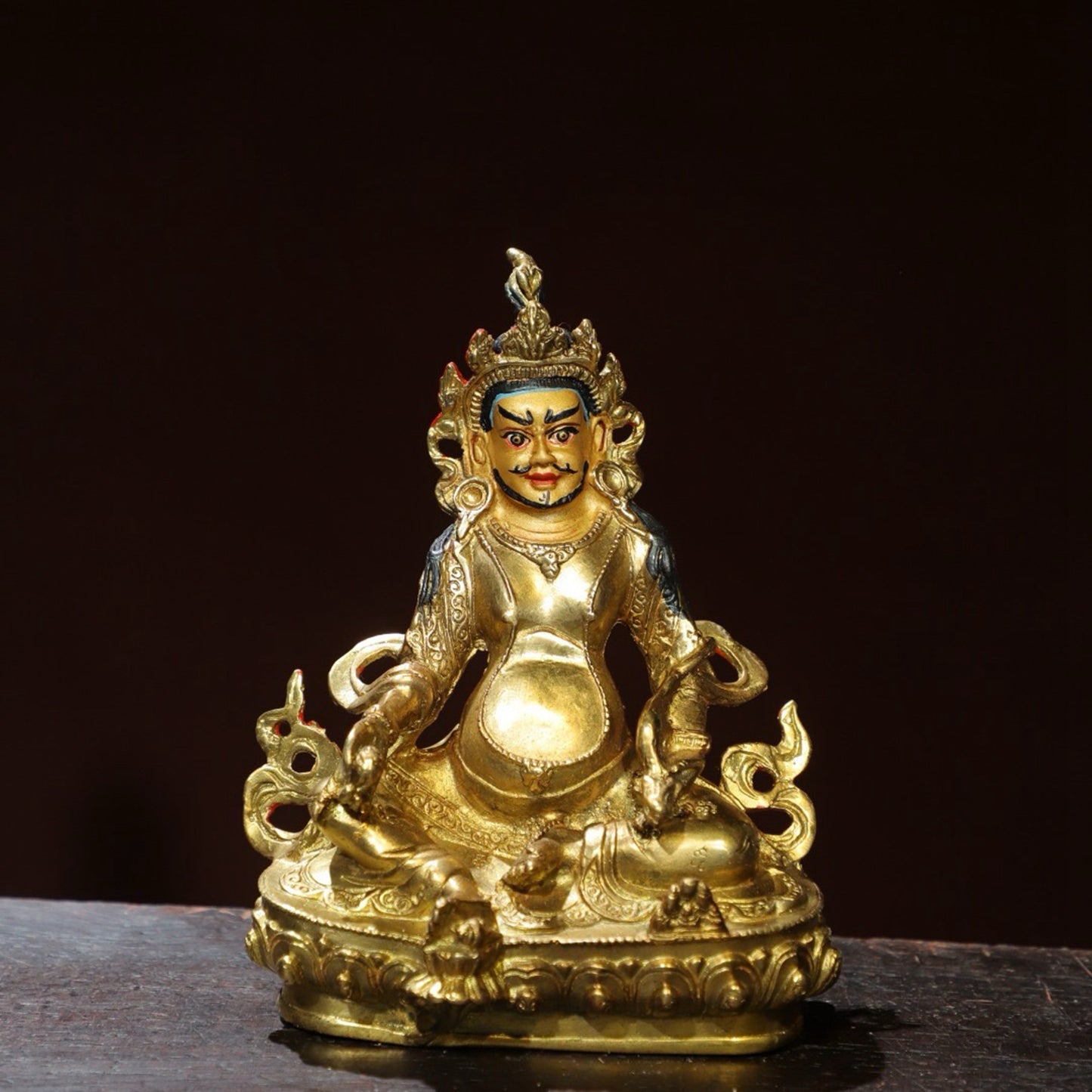 Bronze painted Buddha statue of the Yellow God of Wealth