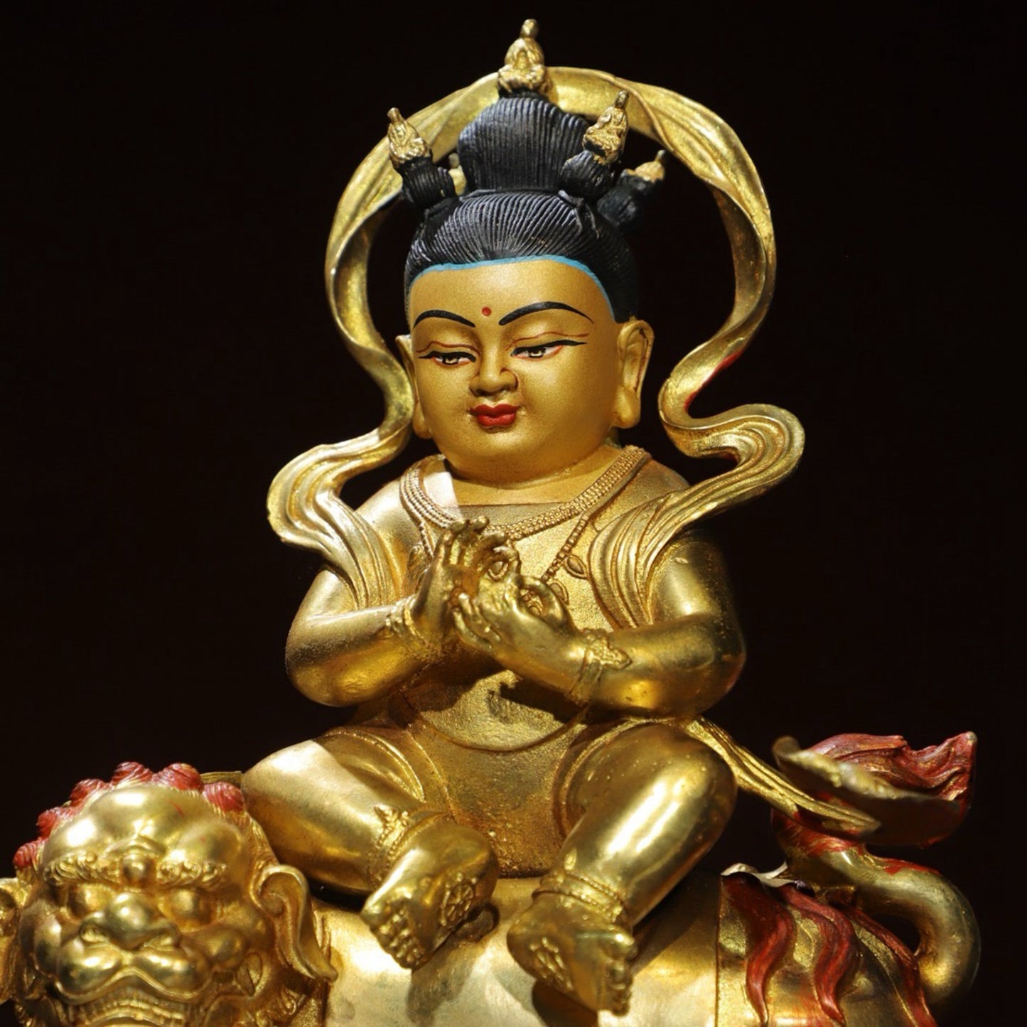 Bronze painted [Boy Riding Beast] Buddha statue