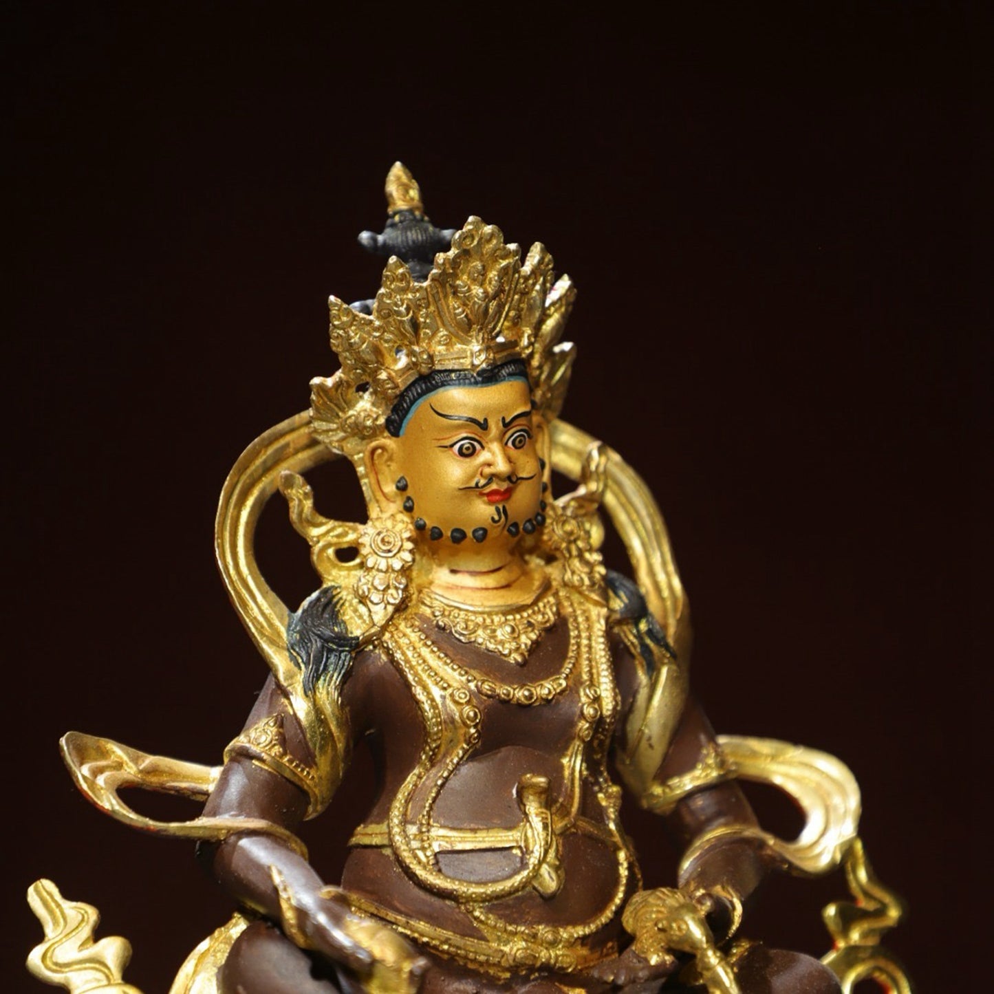 Bronze painted Buddha statue of the Yellow God of Wealth