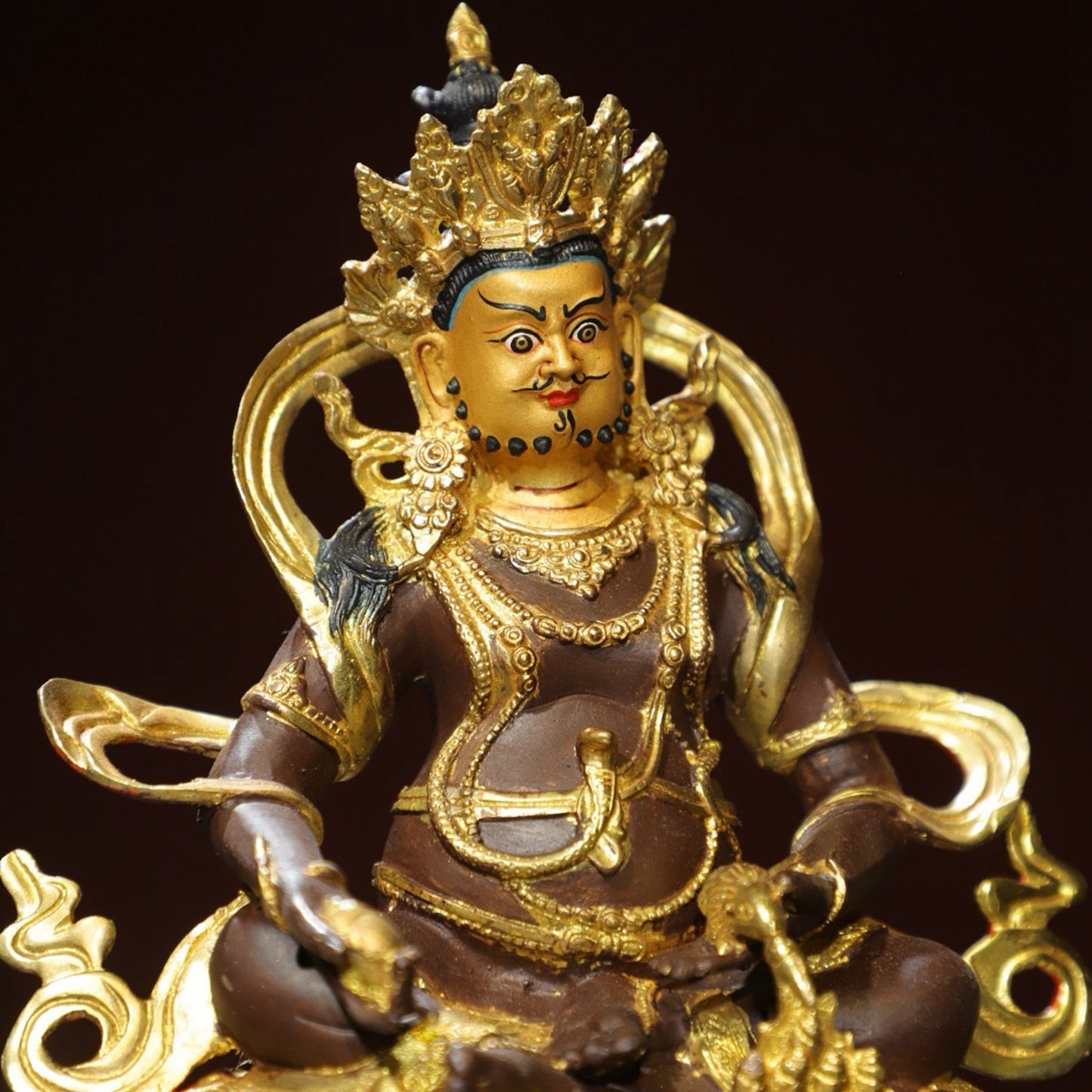 Bronze painted Buddha statue of the Yellow God of Wealth