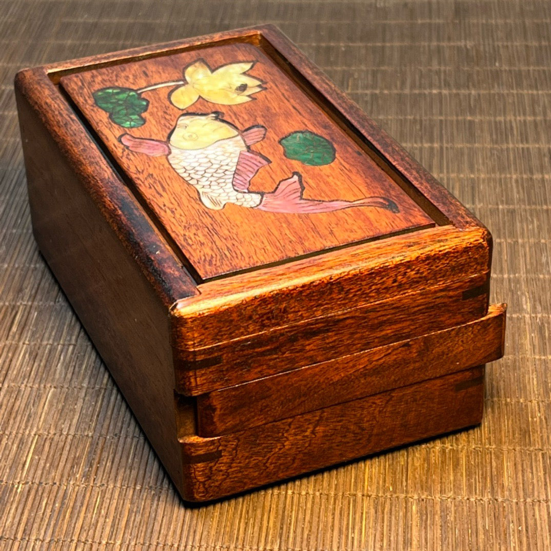 Chinese antique rosewood inlaid with seashells, with over a year's worth of carved mechanism boxes