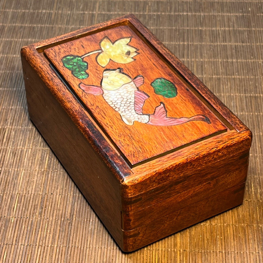 Chinese antique rosewood inlaid with seashells, with over a year's worth of carved mechanism boxes