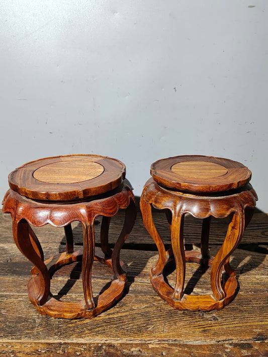 A pair of Chinese antique rosewood bent leg flower rack ornaments