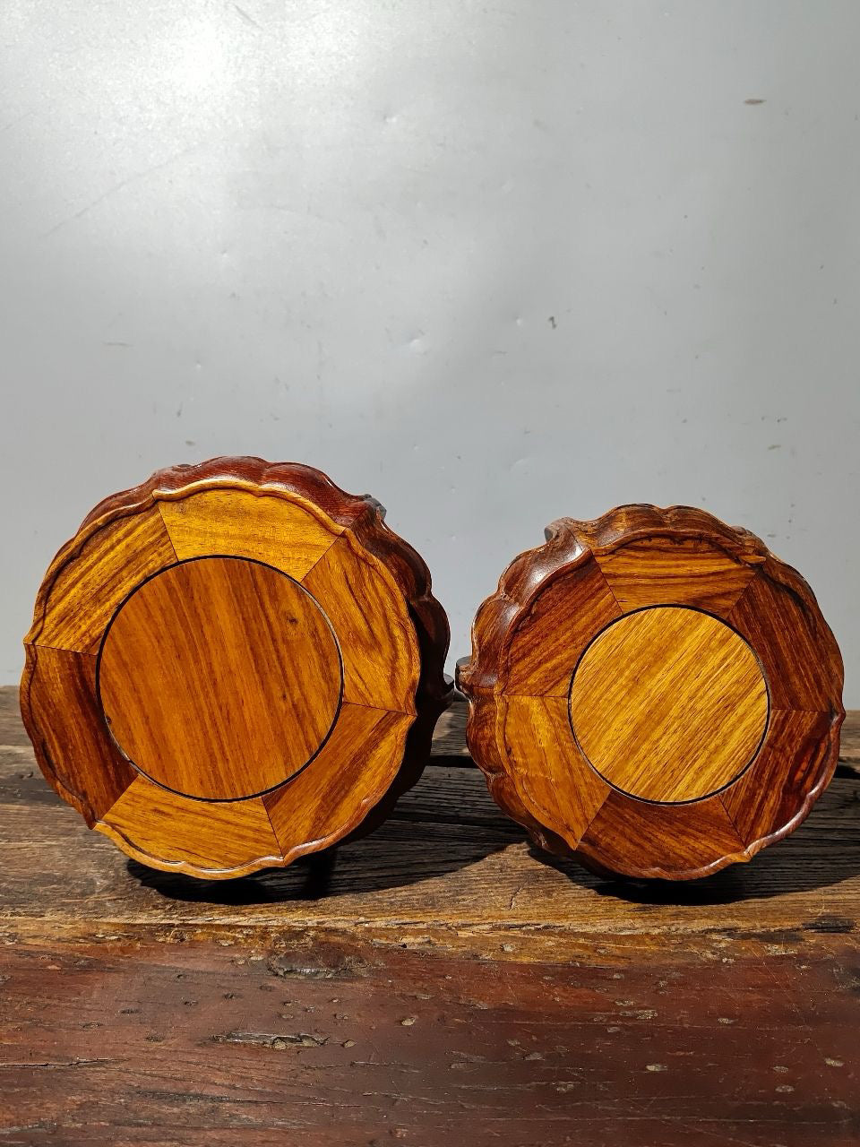 A pair of Chinese antique rosewood bent leg flower rack ornaments