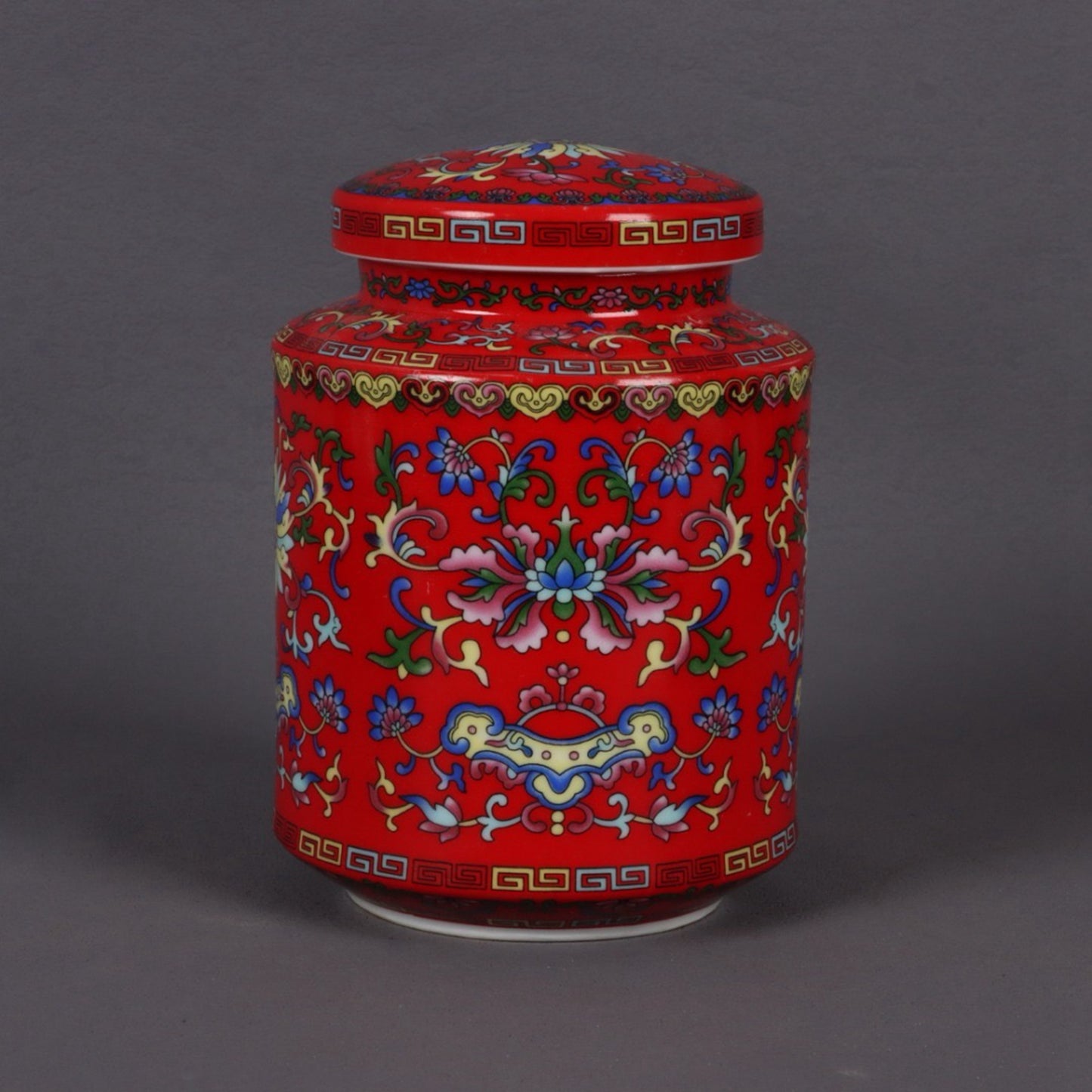 Red glazed enamel colored flower pattern tea tube