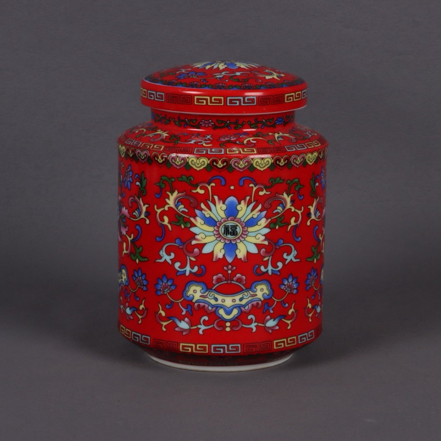 Red glazed enamel colored flower pattern tea tube