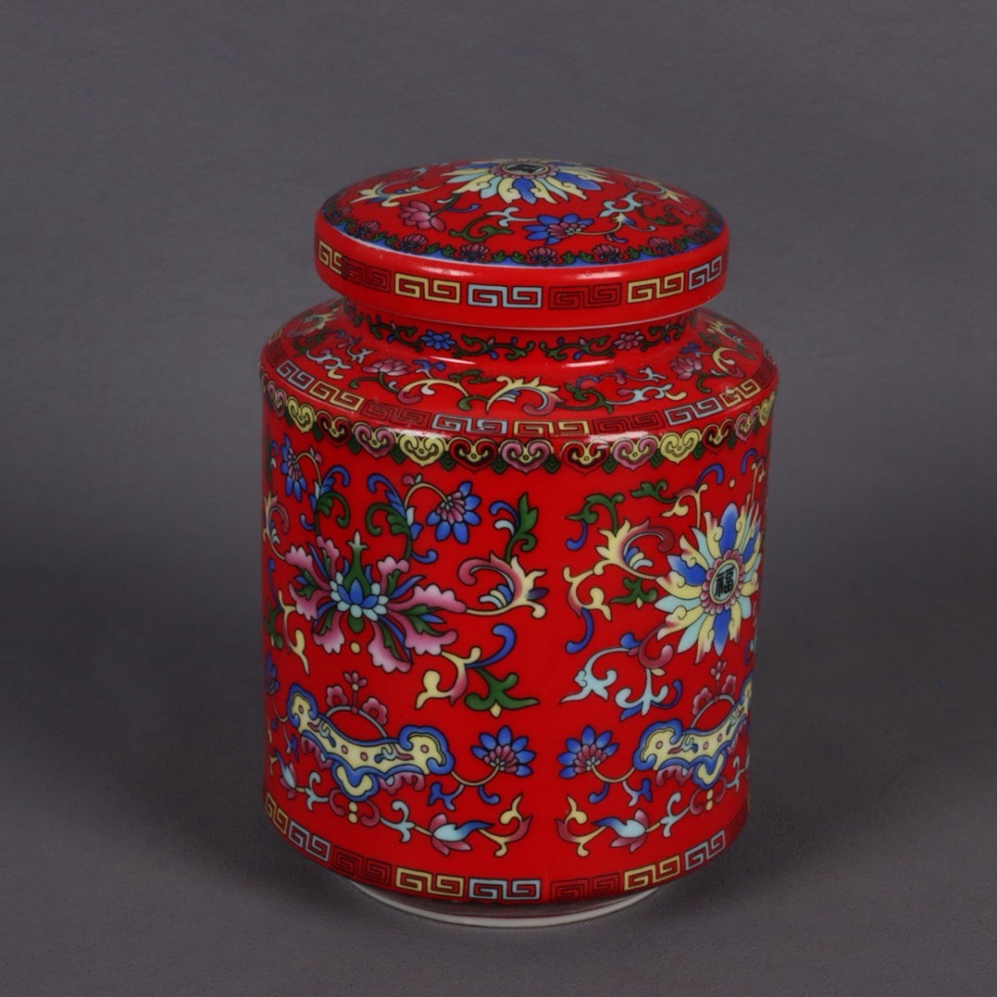 Red glazed enamel colored flower pattern tea tube