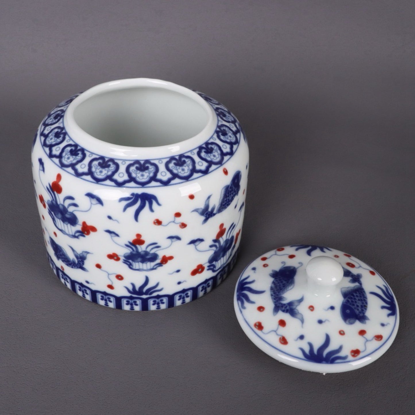 Blue and white glazed red fish algae patterned tea jar