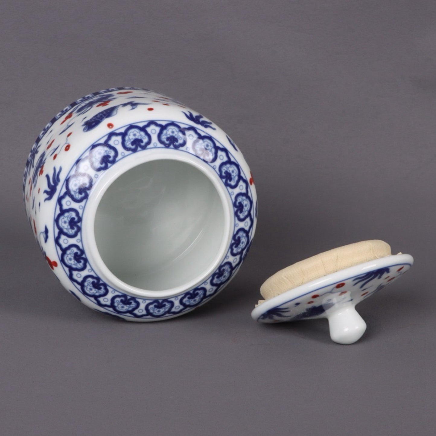 Blue and white glazed red fish algae patterned tea jar