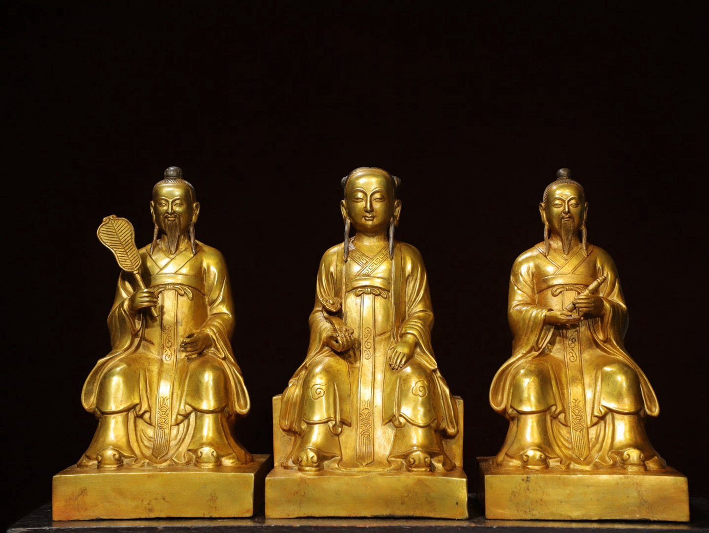 A set of bronze gilded Buddha statues of Sanmao Zhenjun