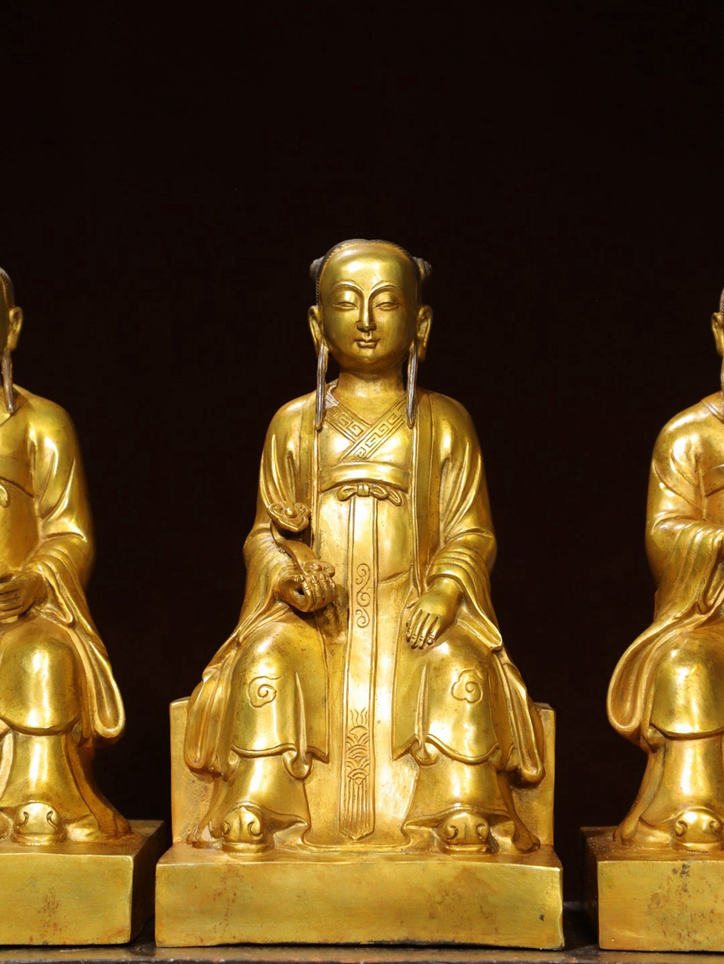 A set of bronze gilded Buddha statues of Sanmao Zhenjun