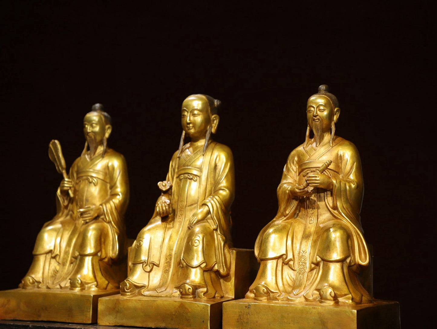 A set of bronze gilded Buddha statues of Sanmao Zhenjun