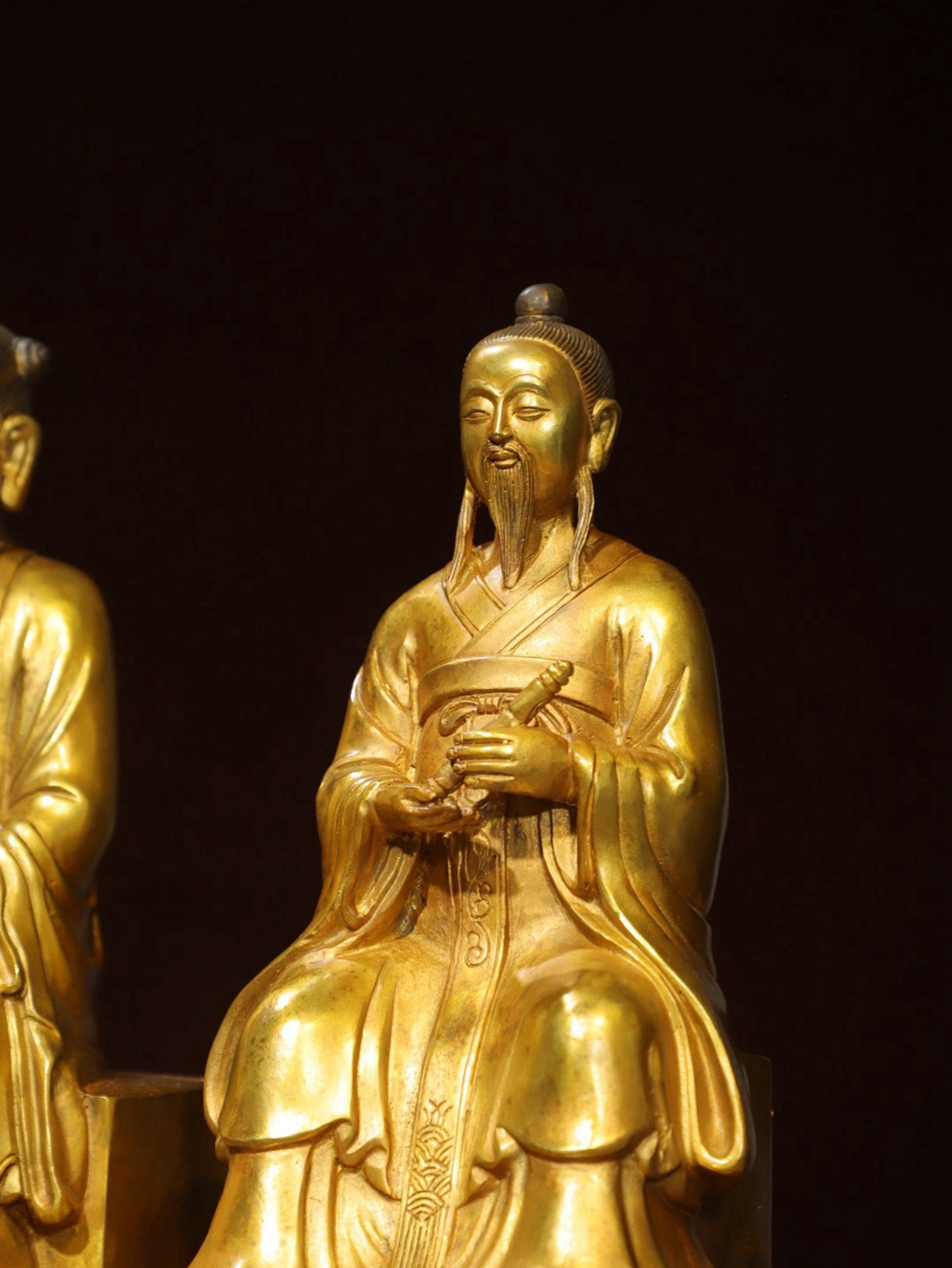 A set of bronze gilded Buddha statues of Sanmao Zhenjun