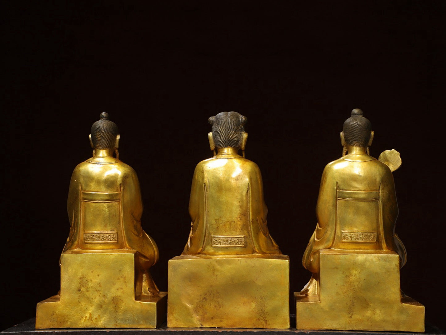 A set of bronze gilded Buddha statues of Sanmao Zhenjun