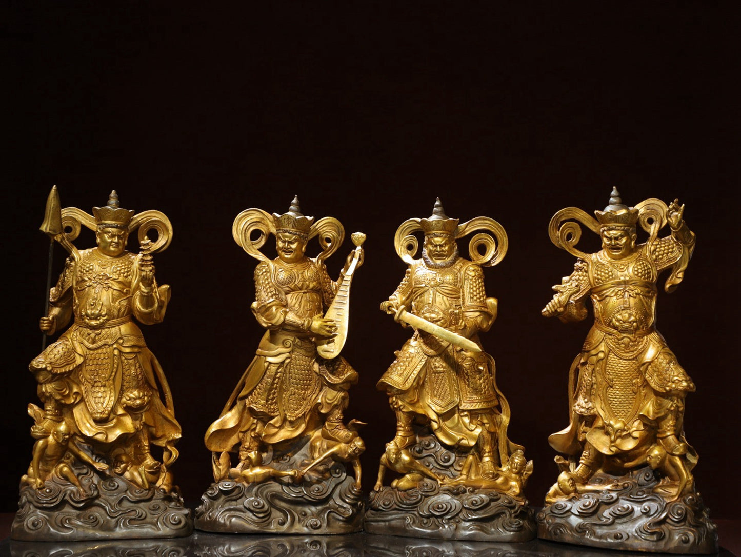 A set of bronze gilded Buddha statues of the Four Heavenly Kings