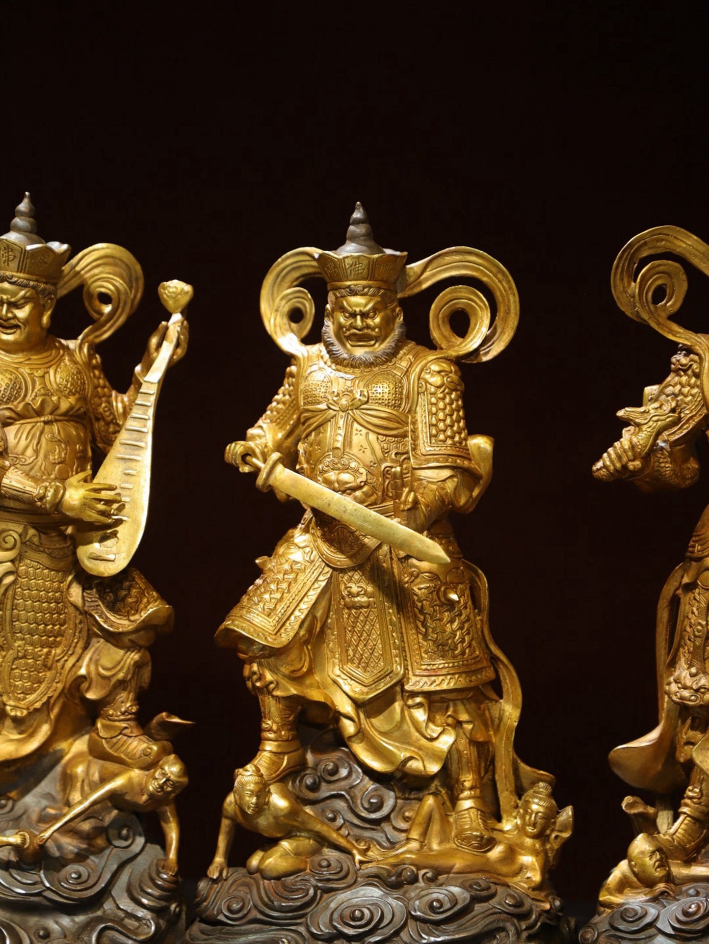 A set of bronze gilded Buddha statues of the Four Heavenly Kings