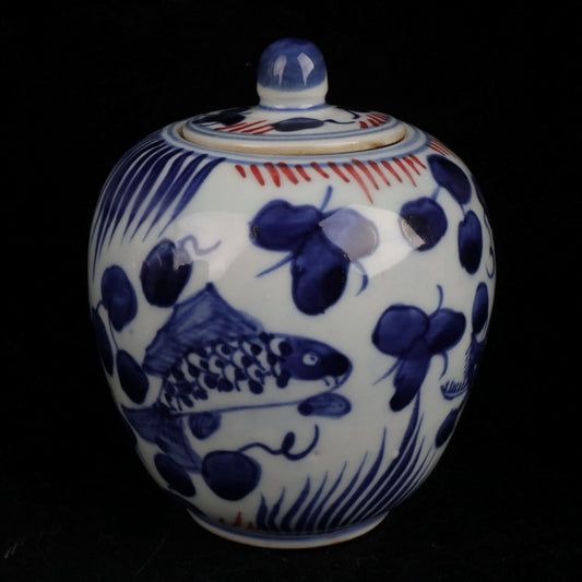 Blue and white glazed red fish and algae patterned small jar