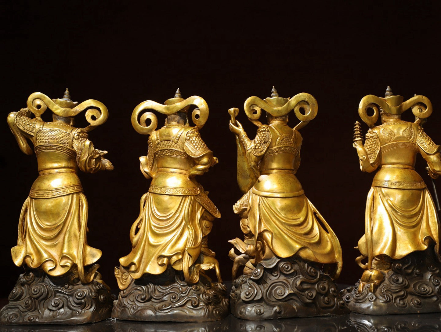 A set of bronze gilded Buddha statues of the Four Heavenly Kings