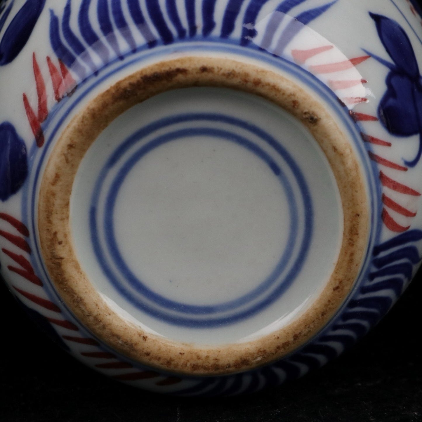 Blue and white glazed red fish and algae patterned small jar
