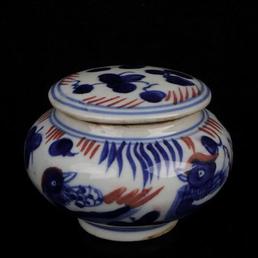 Blue and white glazed patterned flat top jar