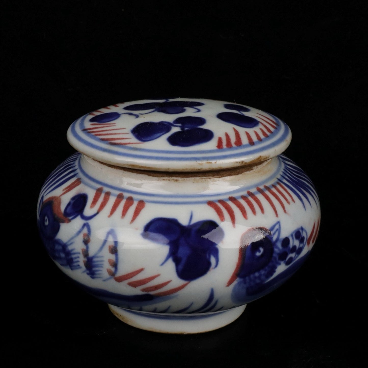 Blue and white glazed patterned flat top jar