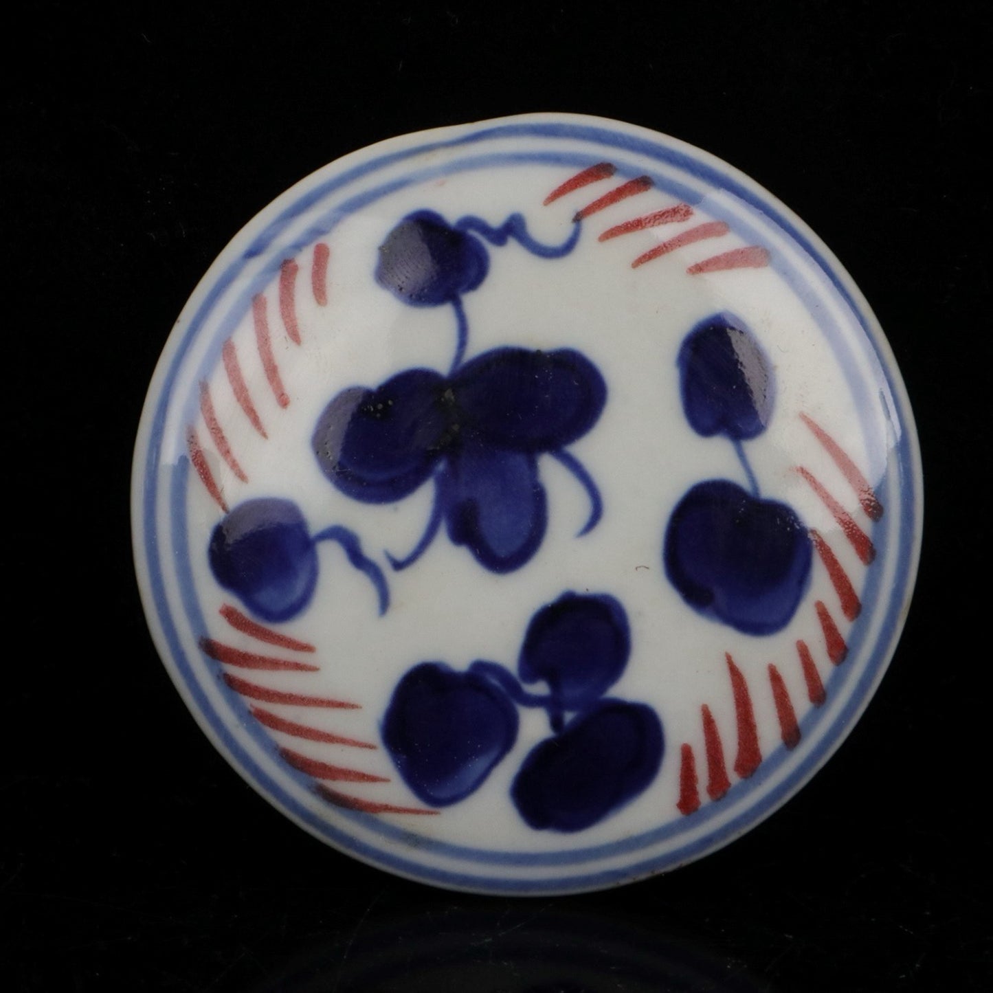 Blue and white glazed patterned flat top jar