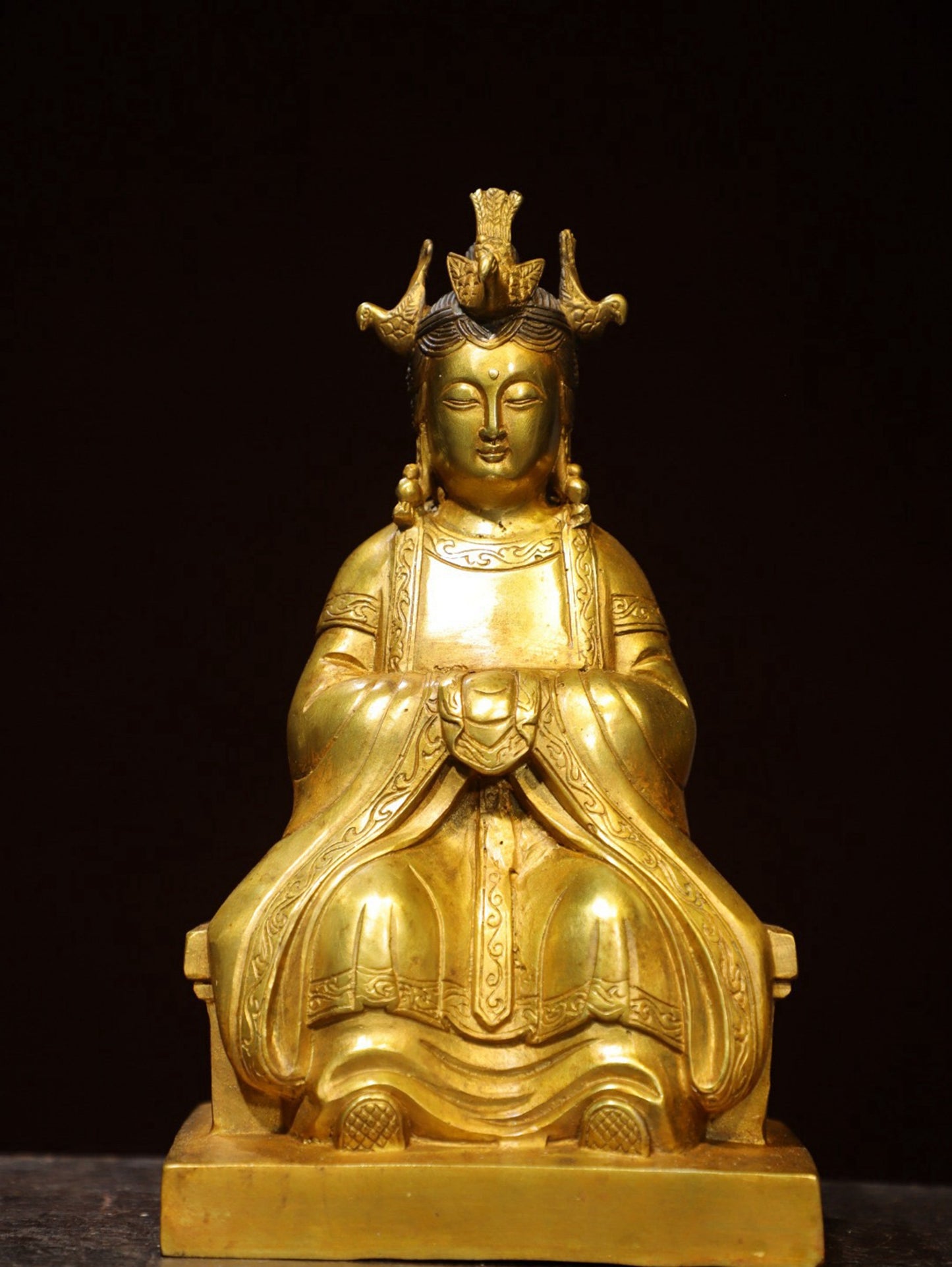 Bronze gilded statue of the Queen Mother Buddha