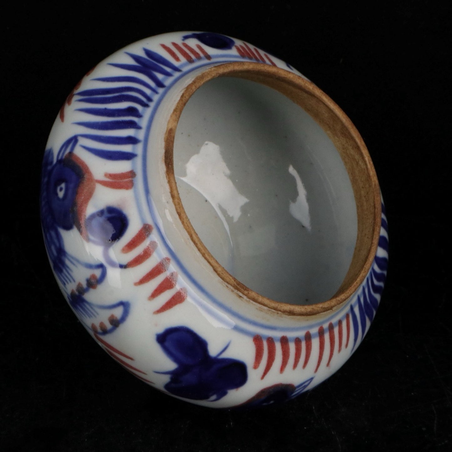 Blue and white glazed patterned flat top jar
