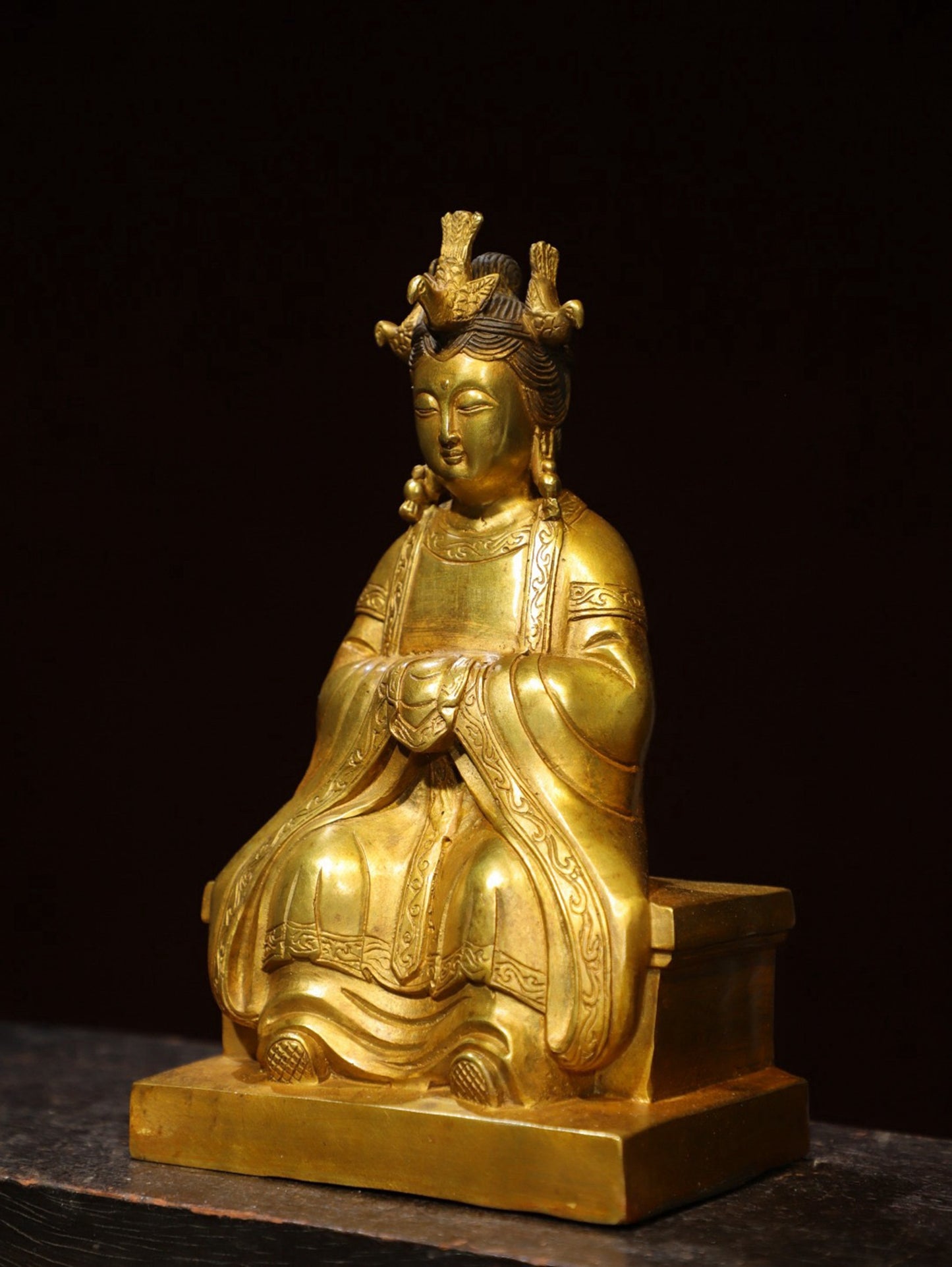 Bronze gilded statue of the Queen Mother Buddha
