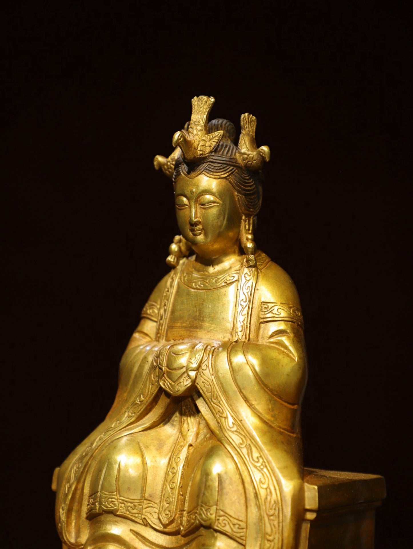Bronze gilded statue of the Queen Mother Buddha
