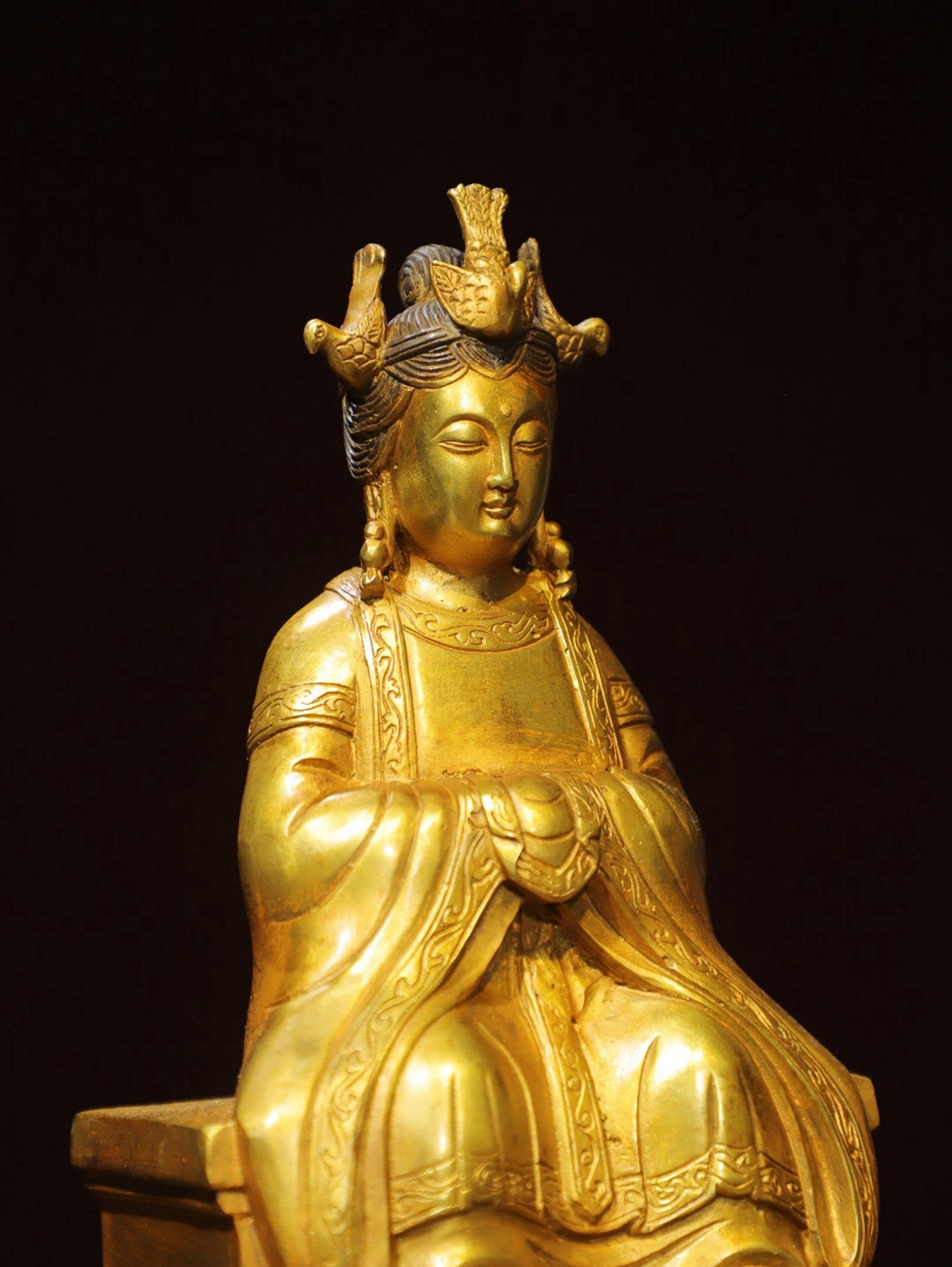 Bronze gilded statue of the Queen Mother Buddha