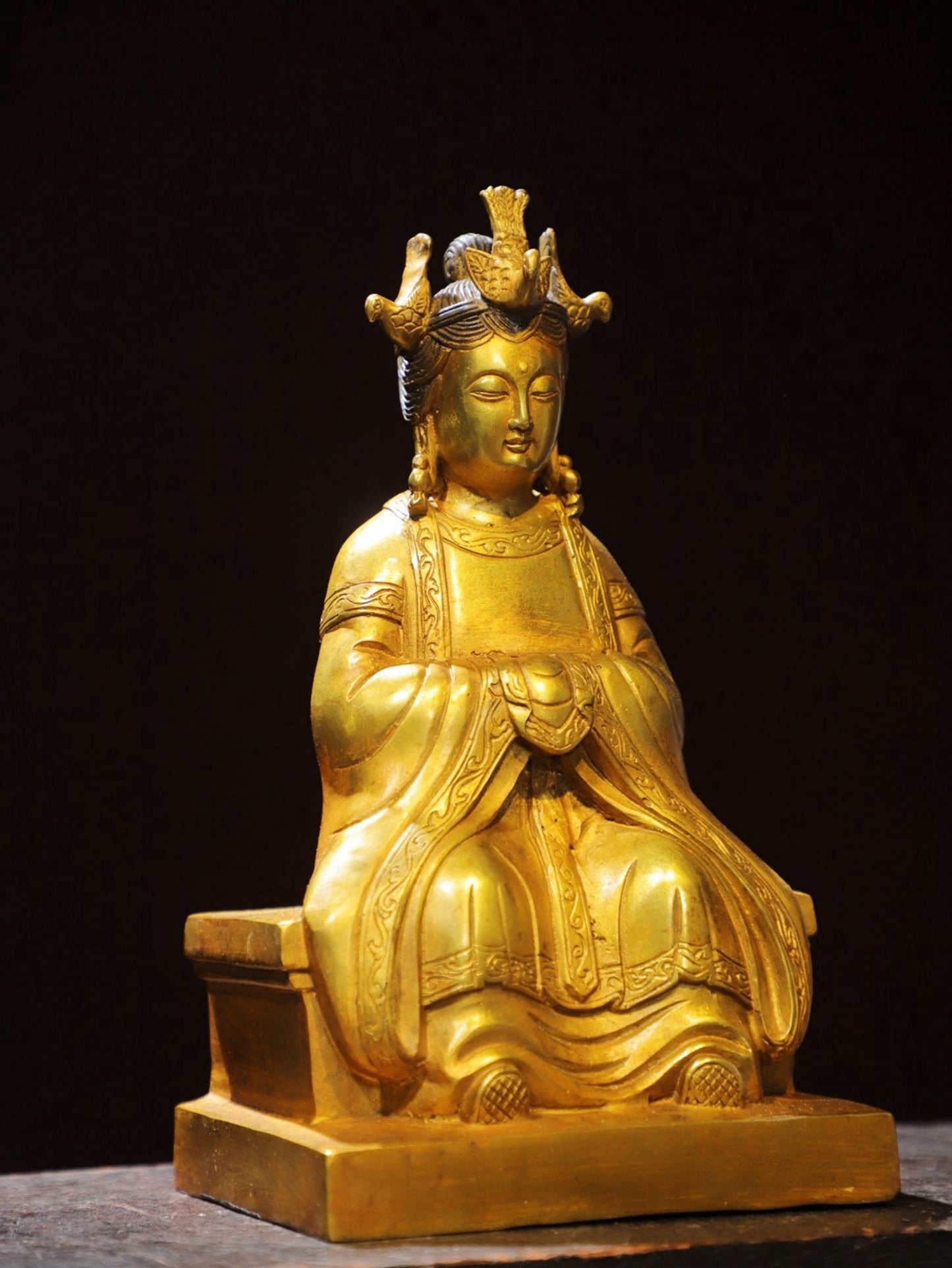 Bronze gilded statue of the Queen Mother Buddha