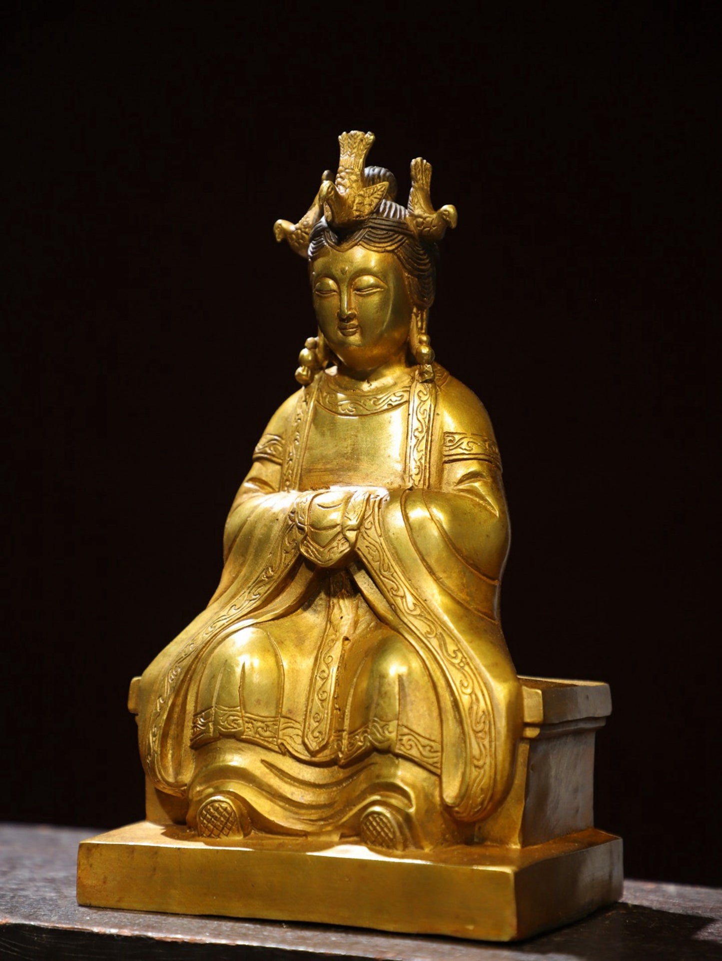 Bronze gilded statue of the Queen Mother Buddha