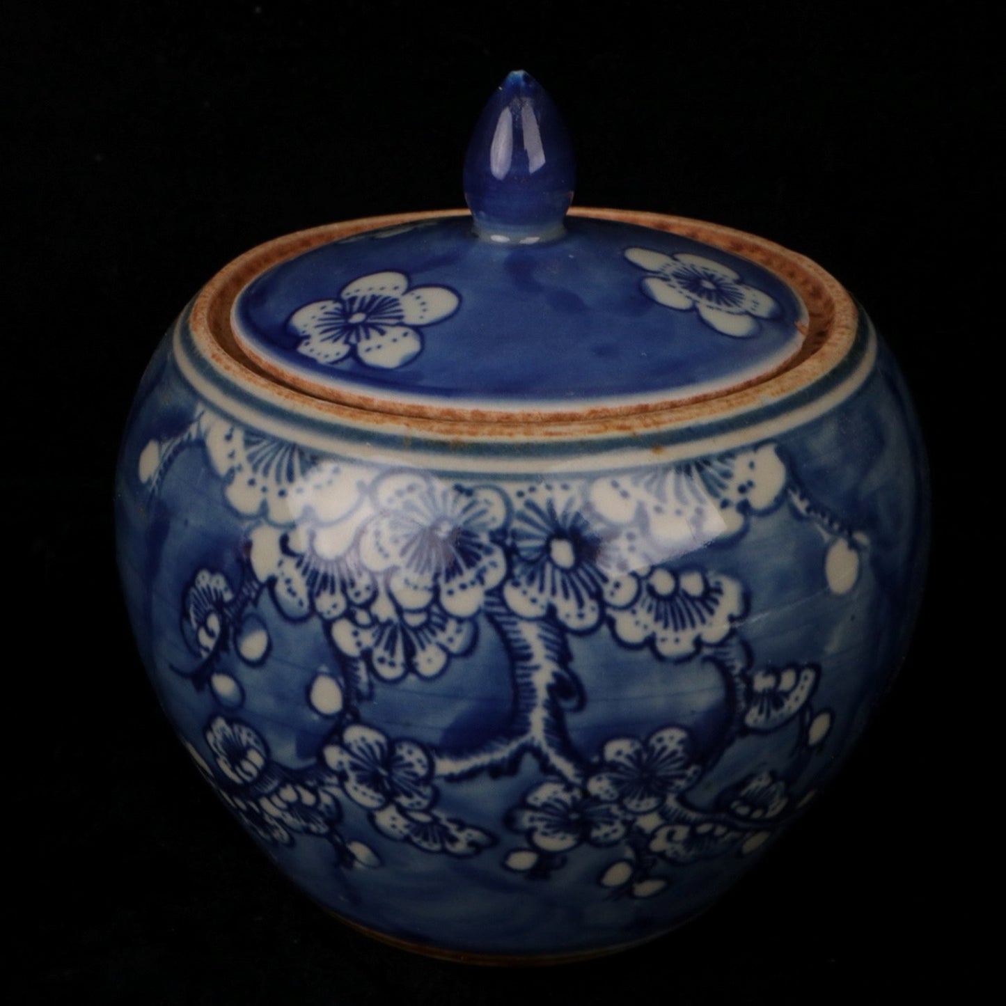 Blue and white plum blossom patterned lid jar