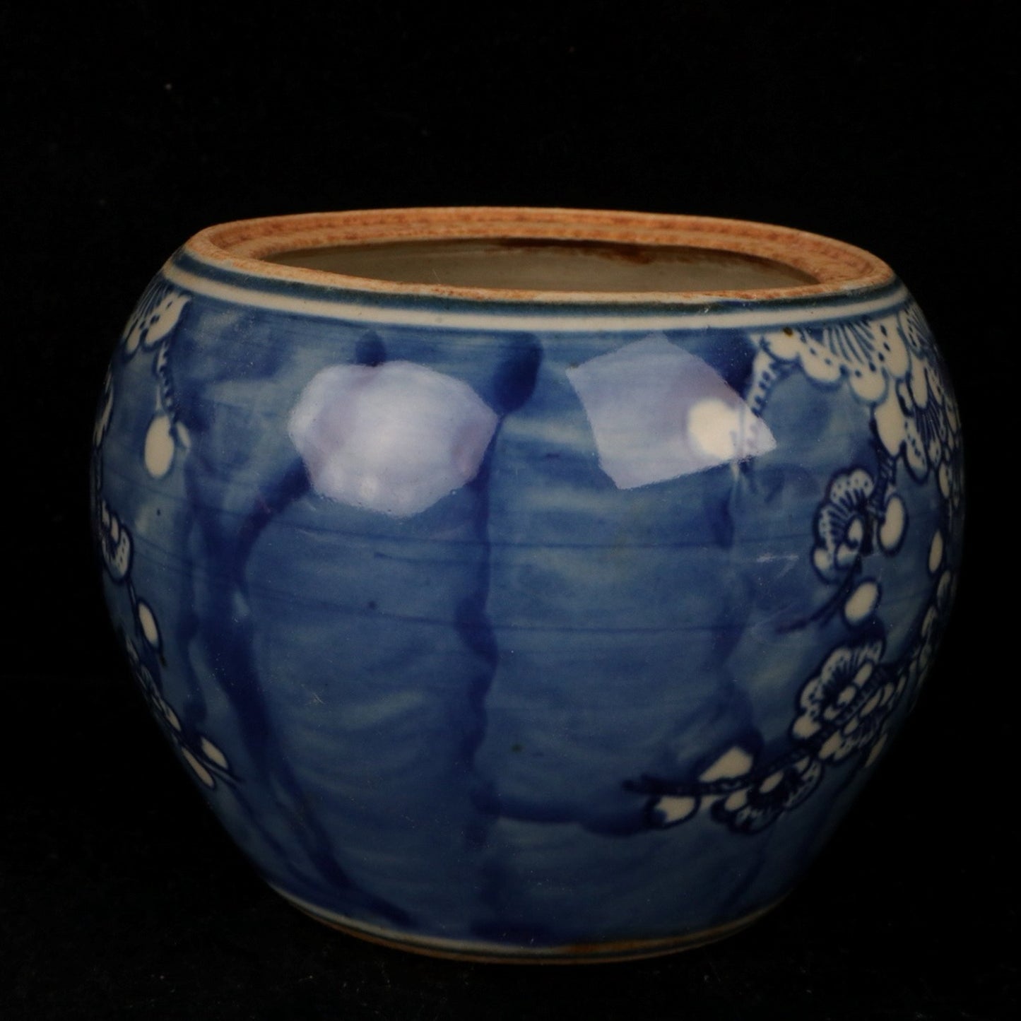 Blue and white plum blossom patterned lid jar