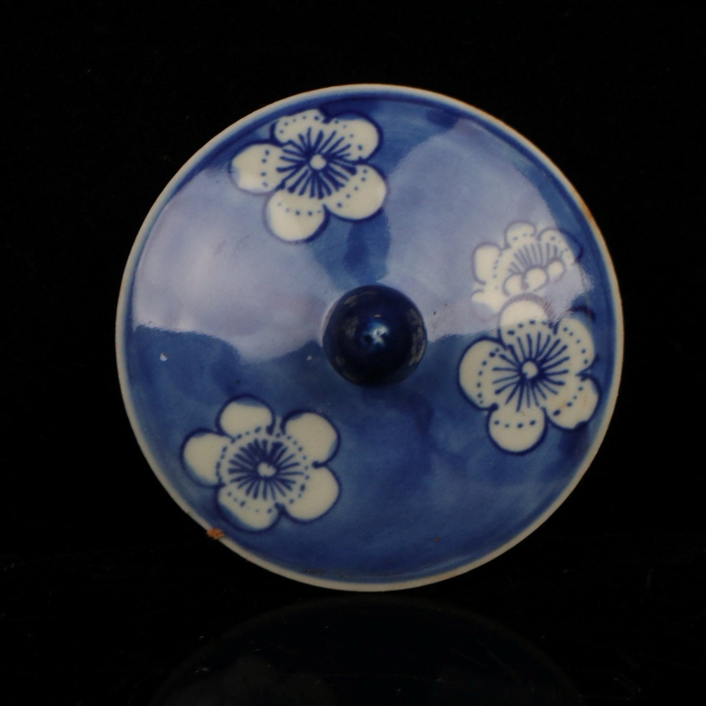 Blue and white plum blossom patterned lid jar