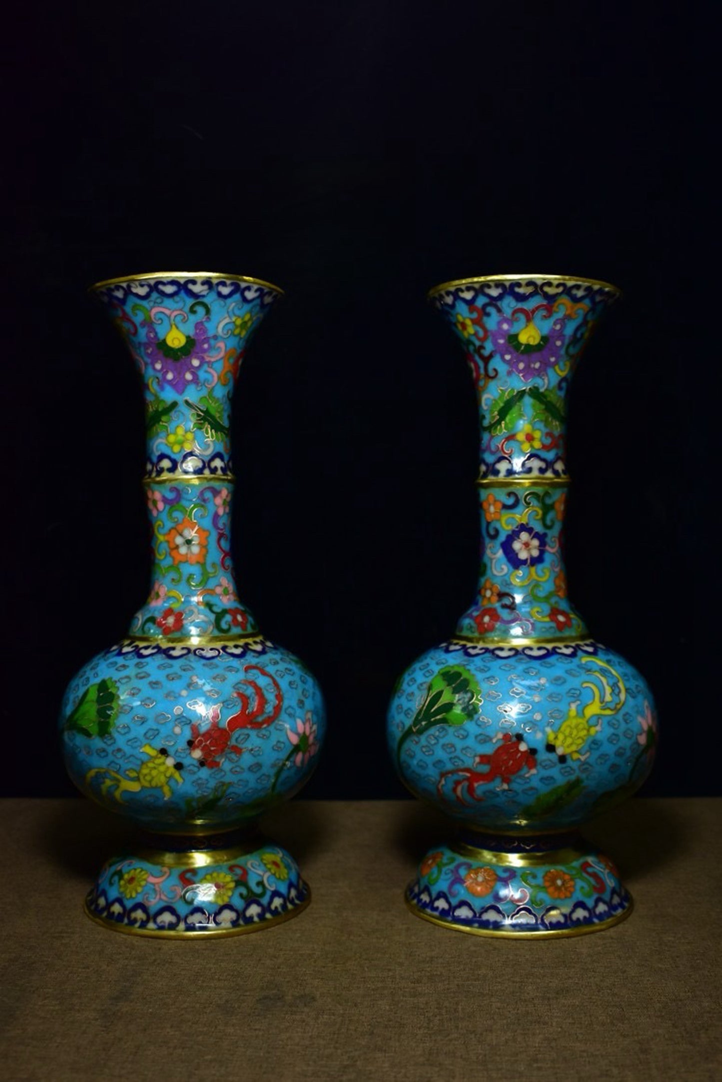 A pair of brass cloisonn é vases