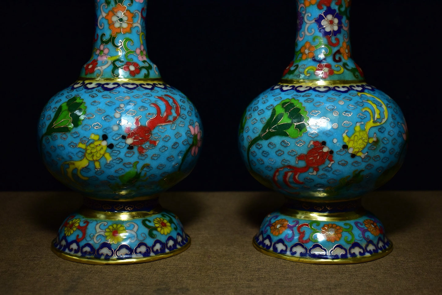 A pair of brass cloisonn é vases