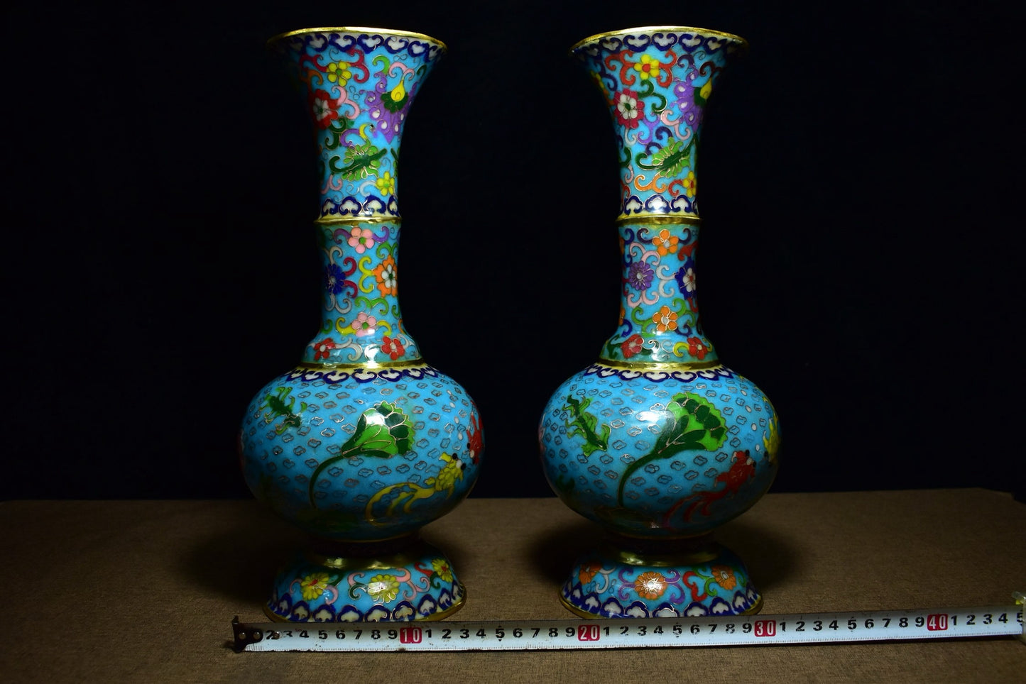 A pair of brass cloisonn é vases