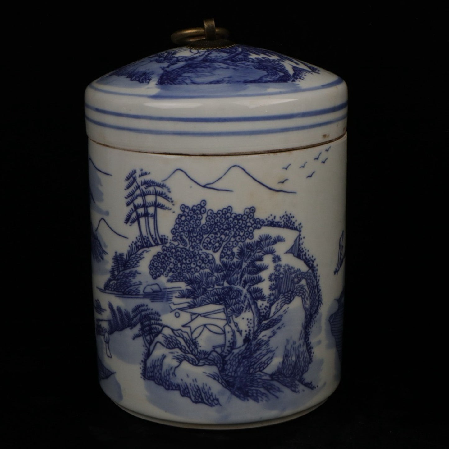 Blue and white landscape patterned covered jar