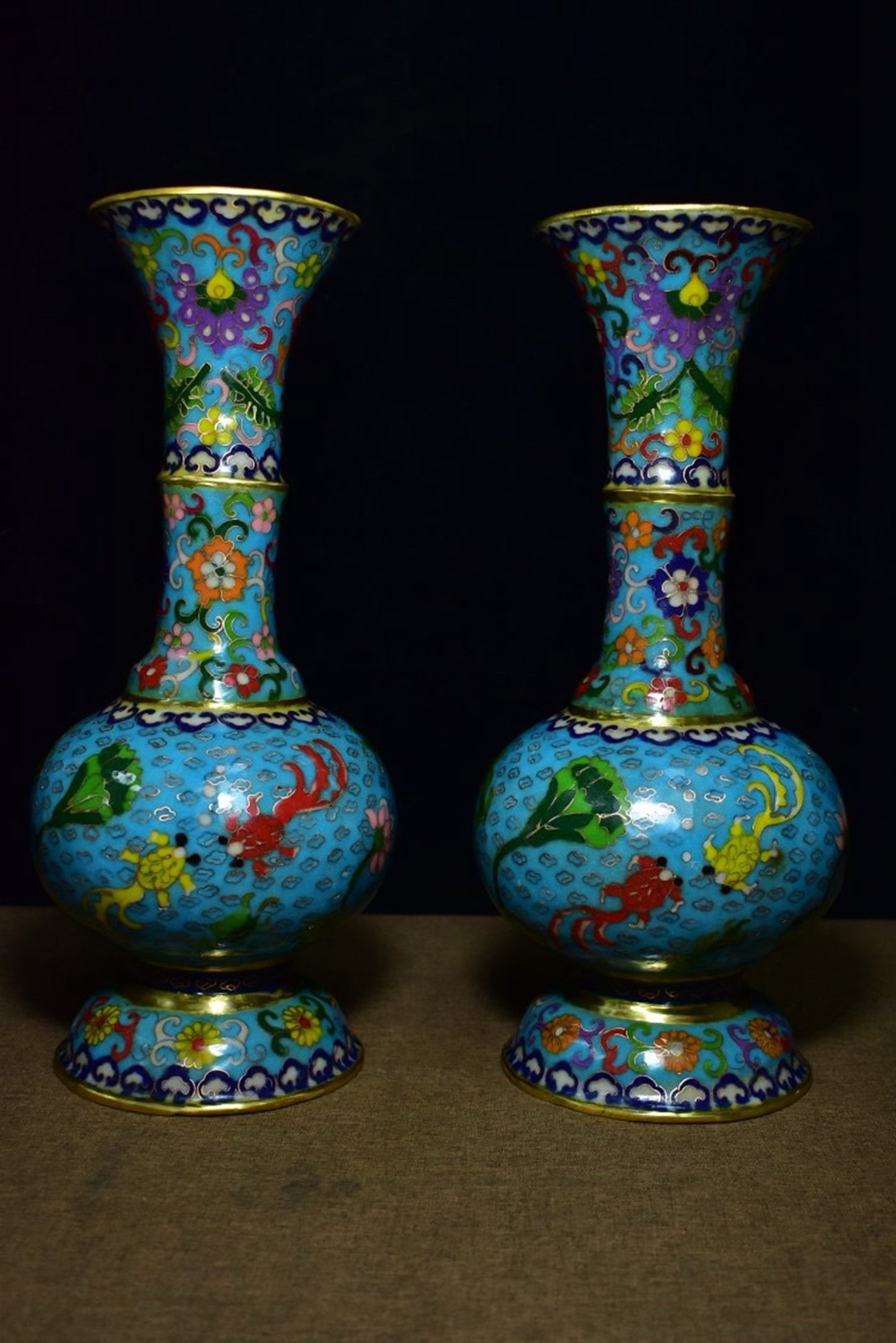 A pair of brass cloisonn é vases