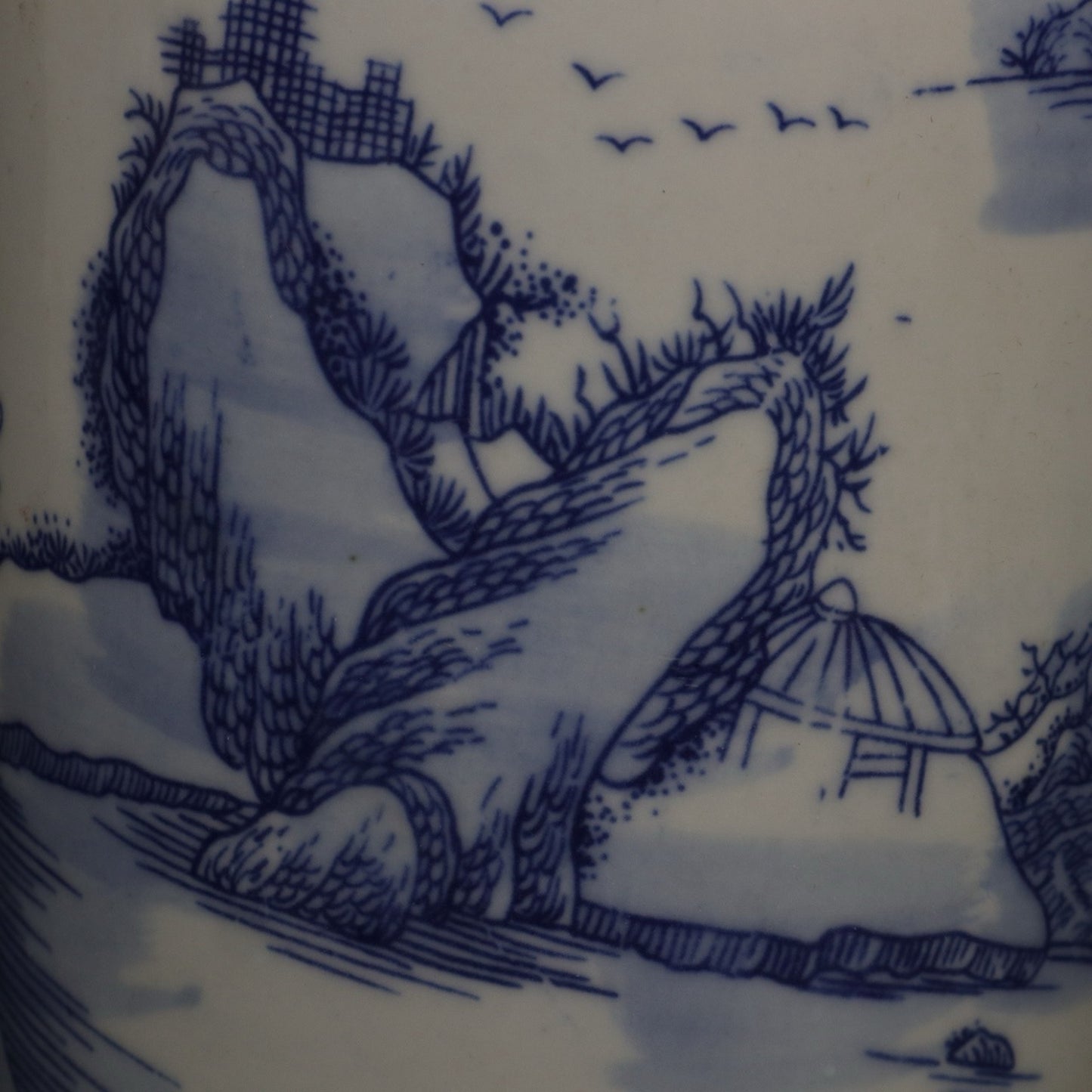 Blue and white landscape patterned covered jar