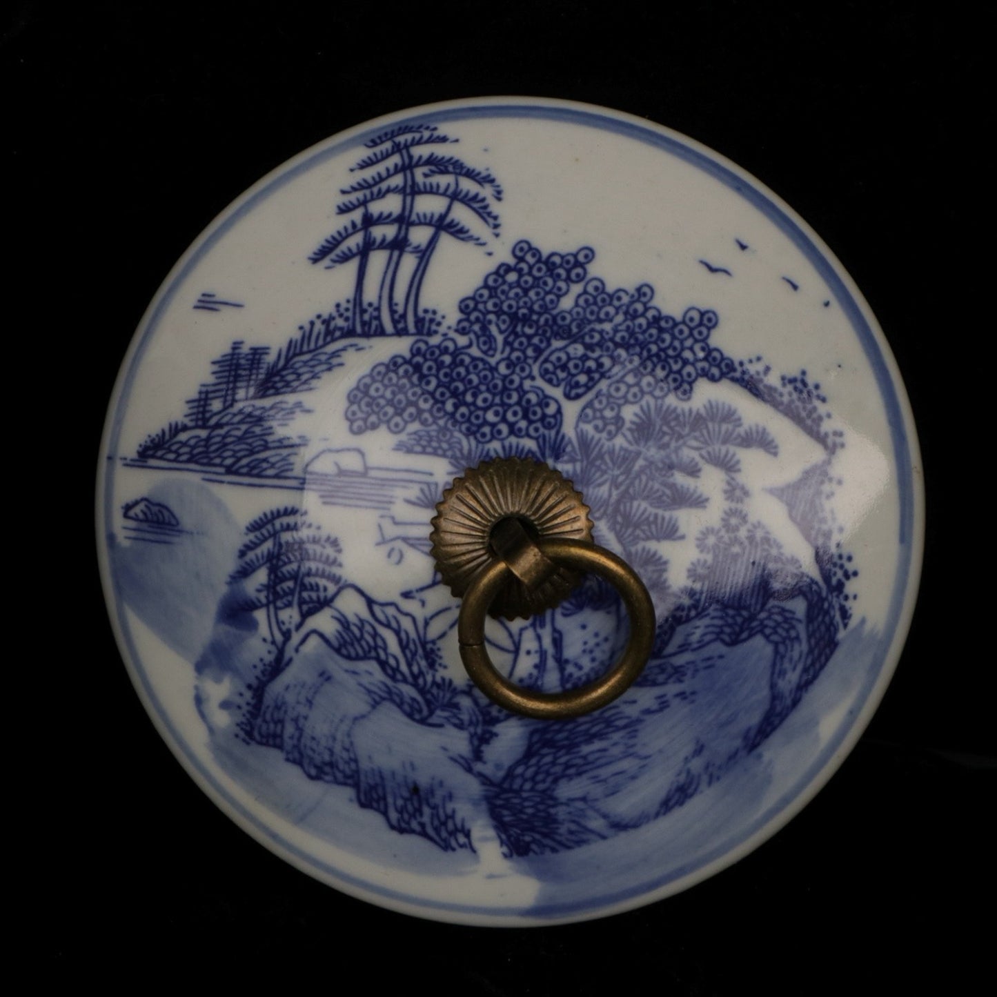Blue and white landscape patterned covered jar