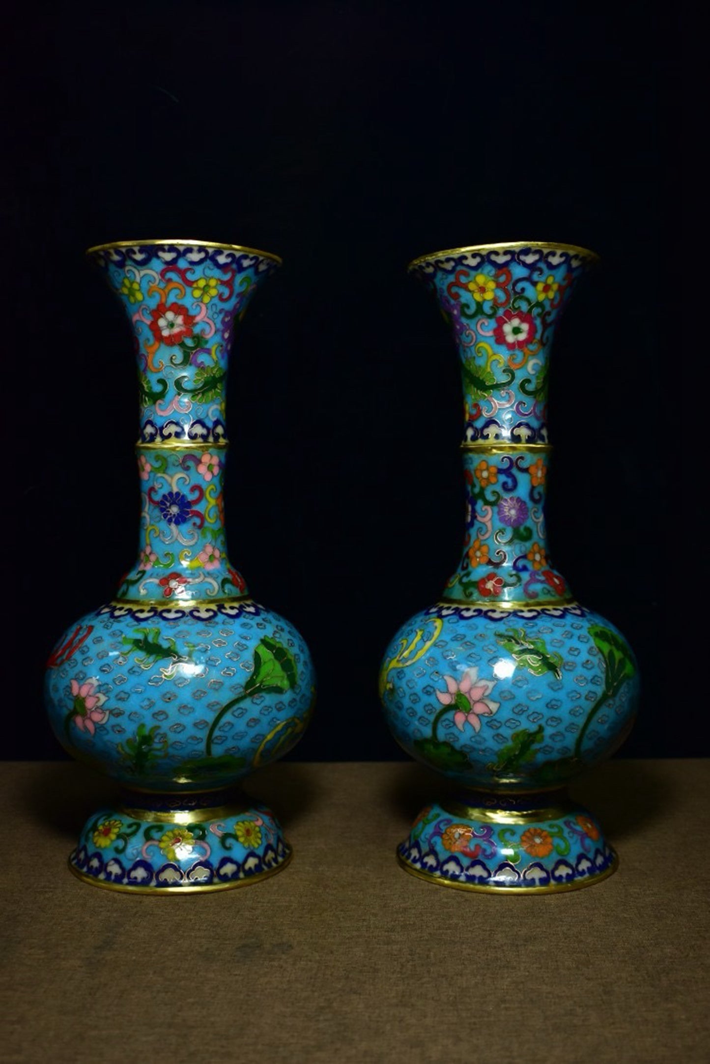 A pair of brass cloisonn é vases