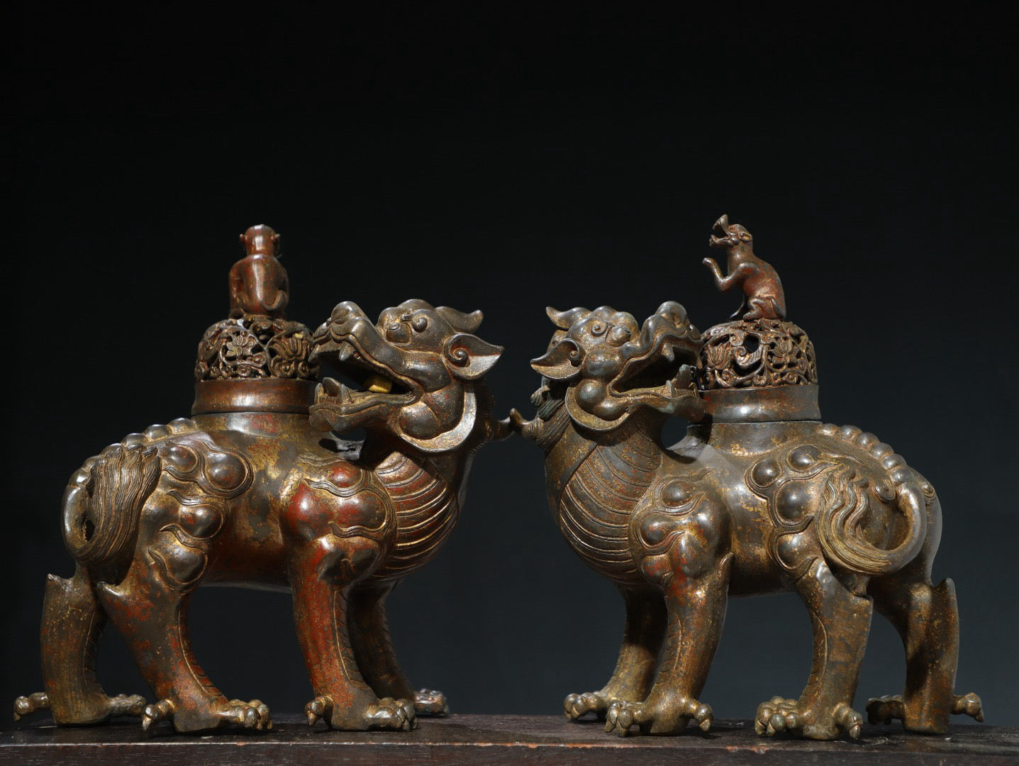 A pair of Chinese antique pure copper auspicious beast ornaments