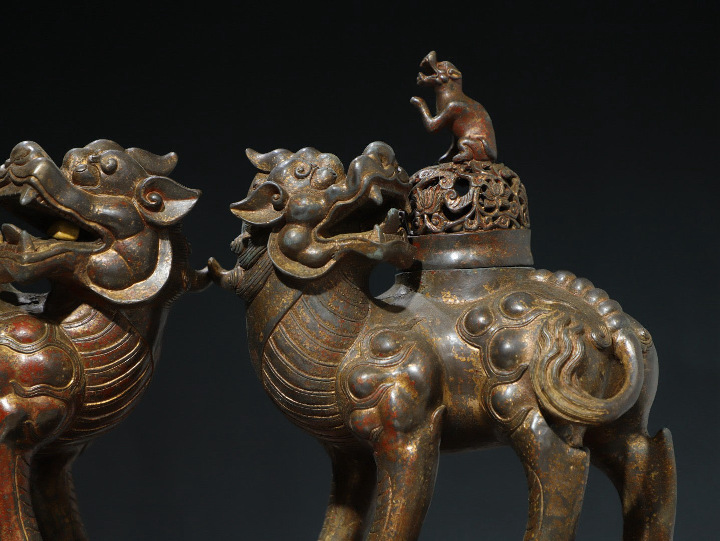 A pair of Chinese antique pure copper auspicious beast ornaments